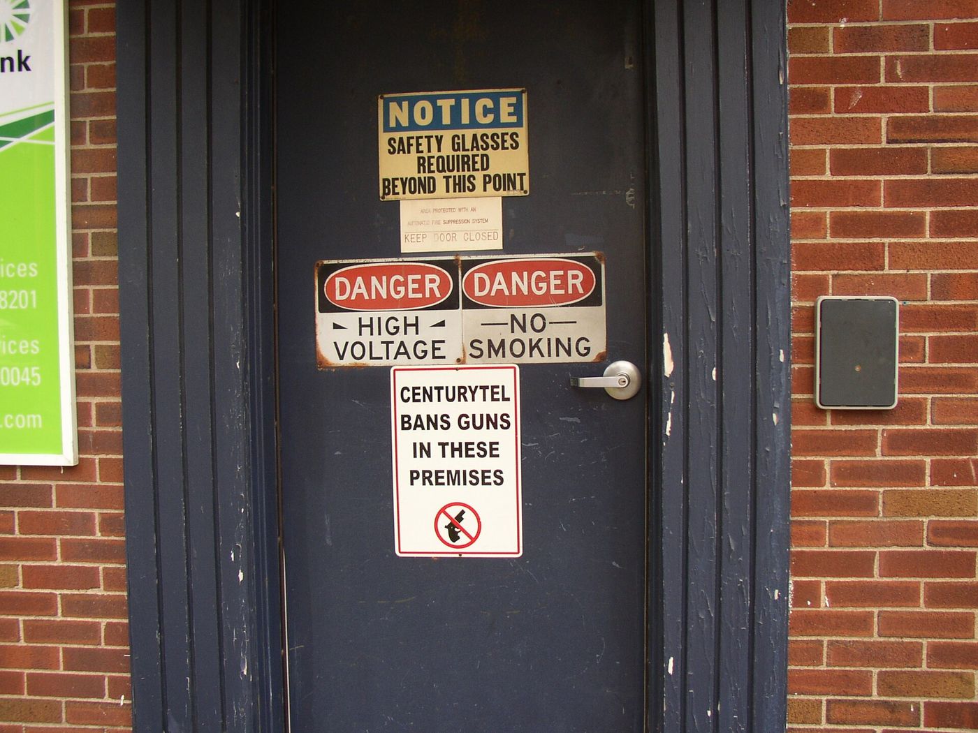 Door with several safety signs
